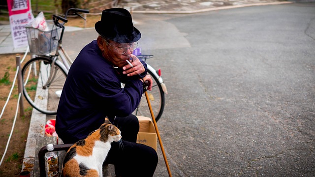 Old Himalayan Man with his cat, Story on Art and Artists